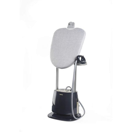 A modern garment steamer with a light gray fabric-covered ironing pad, a dark navy blue base, and a silver metal stand, shown against a plain white background.