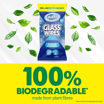 Duzzit 60-pack glass wipes surrounded by green leaves, highlighting that the wipes are 100% biodegradable and made from plant fibres.