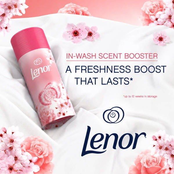 Lenor Cherry Blossom and Rose Water in-wash scent booster on white fabric with flowers, highlighting freshness lasting up to 12 weeks in storage.