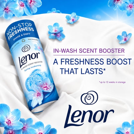 Lenor Spring Awakening scent booster on white fabric with blue flowers, highlighting freshness lasting up to 12 weeks in storage.
