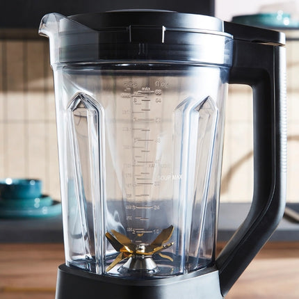 Clear Morphy Richards blender jug with black handle, pouring spout, measurement markings and gold-tone blades.