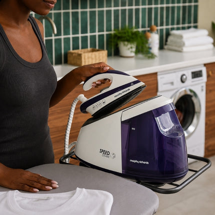Woman placing the Morphy Richards Speed Steam iron securely onto its generator base after use.