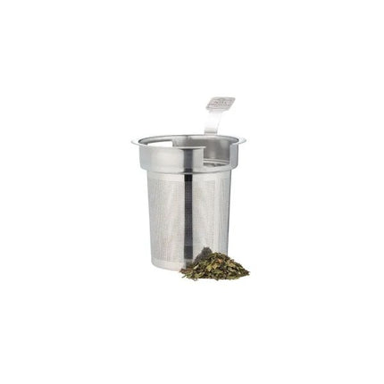 A stainless steel mesh tea infuser with a small pile of loose-leaf tea in front, shown on a plain white background.