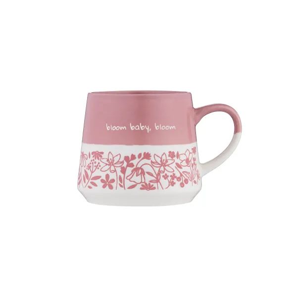A pink and white ceramic mug with a floral pattern band and the text 'bloom baby, bloom' on the side, shown against a plain white background.