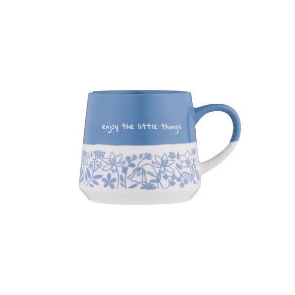A blue and white ceramic mug with a floral pattern and the text 'enjoy the little things' on the side, shown against a plain white background.
