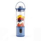A blue Salter portable blender with a clear container filled with fruit, set against a plain white background.