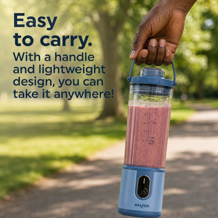 A person holds a Salter portable blender with a pink drink inside, set against a blurred park path background with promotional text on the left.