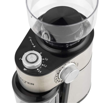 Close-up of a countertop coffee grinder with a brushed silver metal body, black plastic control panel, clear hopper, and white textured dials on a white background.