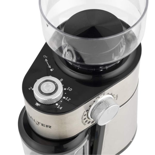 Close-up of a countertop coffee grinder with a brushed silver metal body, black plastic control panel, clear hopper, and white textured dials on a white background.