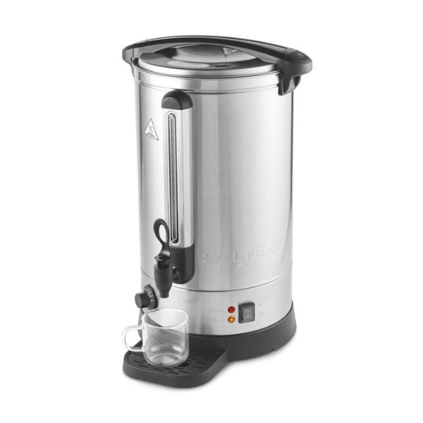A stainless steel commercial coffee or tea dispenser with black plastic lid, handle, and base components, shown on a plain white background with a clear glass cup placed on the drip tray.