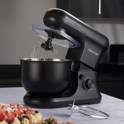 Black Salter stand mixer with whisk attachment on a kitchen counter.