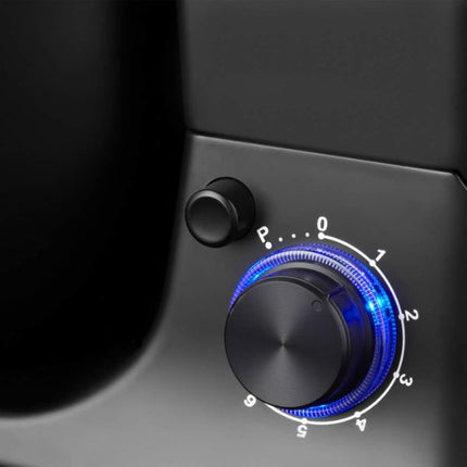 Control knob with blue lighting on a black background