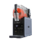 A Salter frozen dessert machine with a black control base, a clear ice bucket containing orange frozen slushie, and a gray textured side panel, shown on a plain white background.