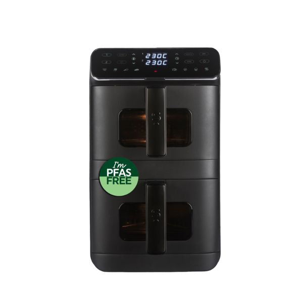 A black multi-functional electric oven and toaster combo with a digital control panel at the top, shown on a plain white background with a green 'I'm PEAS FREE' sticker on the front.