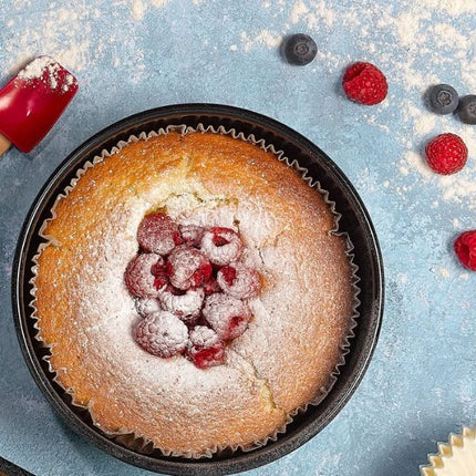 Raspberry-topped sponge cake baked in a Tala 18 cm (7-inch) round cake tin liner