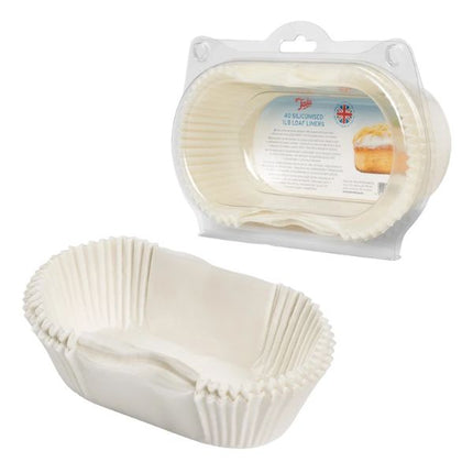 Stack of white Tala 1 lb siliconised loaf tin liners beside the clear pack of 40