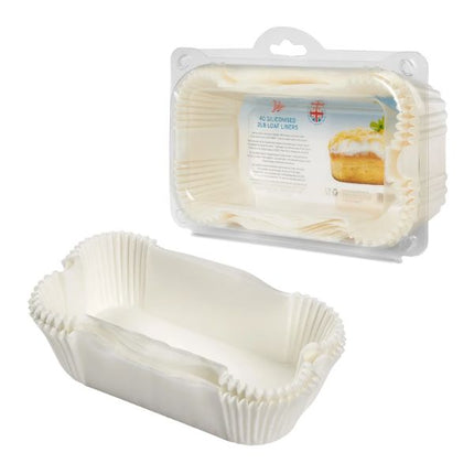 Stack of white Tala 2 lb siliconised loaf tin liners beside the clear pack of 40