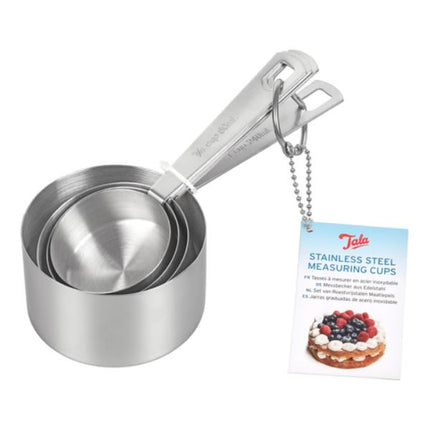 Set of stainless steel measuring cups with a packaging label on a white background
