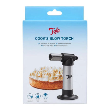 Tala Cook's Blow Torch packaging with a cake on a white background