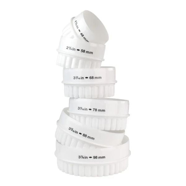 A set of six white plastic funnel nozzles in ascending sizes, stacked vertically on a plain white background. Each funnel is printed with its diameter and conversion to millimeters (e.