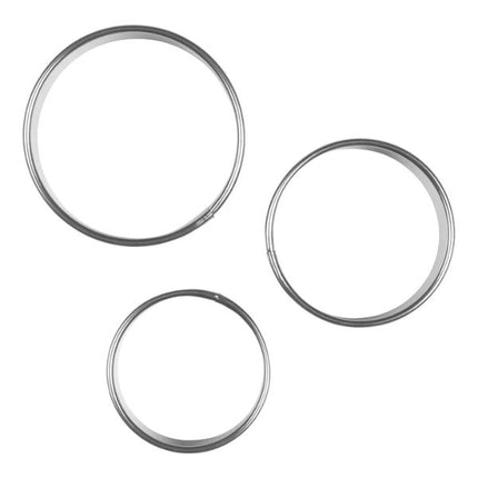 Three metallic rings of different sizes on a white background