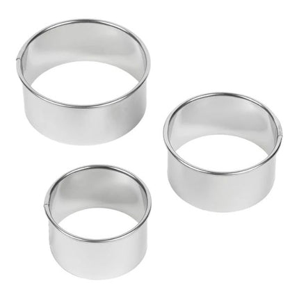 Three metal ring-shaped cookie cutters on a white background