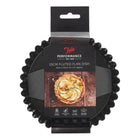 A packaged black 15cm fluted flan dish by Tala Performance, shown in its retail hanging sleeve against a plain white background.