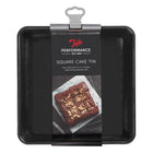 Black square cake tin with Tala Performance packaging featuring brownies.