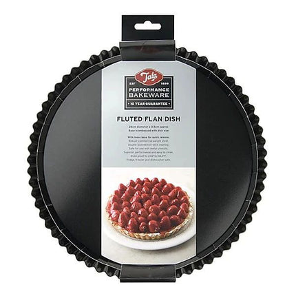 A black fluted round tart pan in its retail packaging, featuring a hanging cardboard header with the Tala brand logo and a label identifying it as a fluted flan dish.