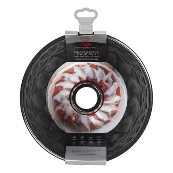 Decorative cake pan with a bundt cake on a white background