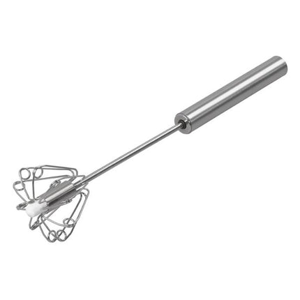 Metal whisk on a white background