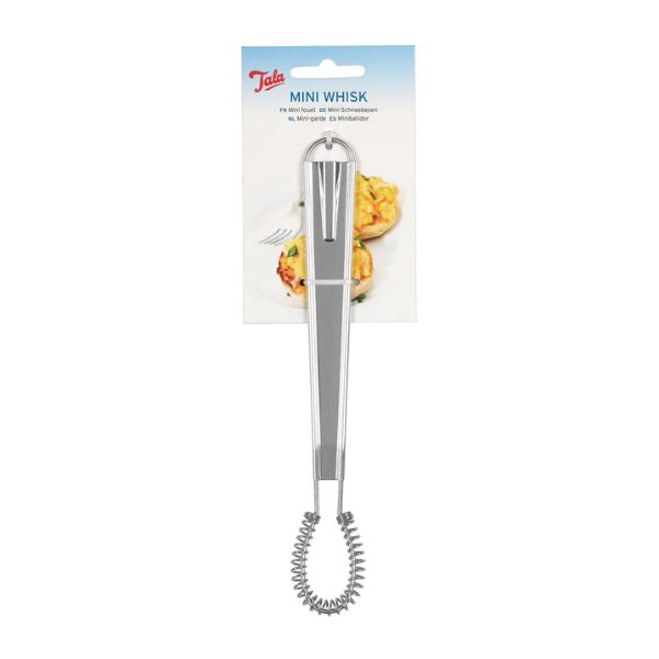 Metal whisk with packaging featuring a banana on a white background