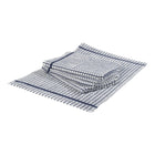 Navy blue and white checked terry tea towels, with four folded and one laid flat.