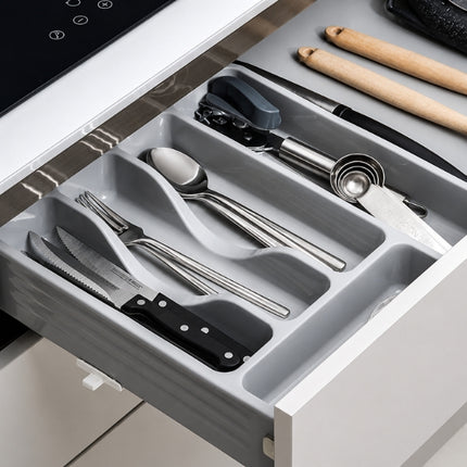 Wham Casa silver cutlery tray inside a kitchen drawer, organising knives, forks, spoons and assorted kitchen tools.