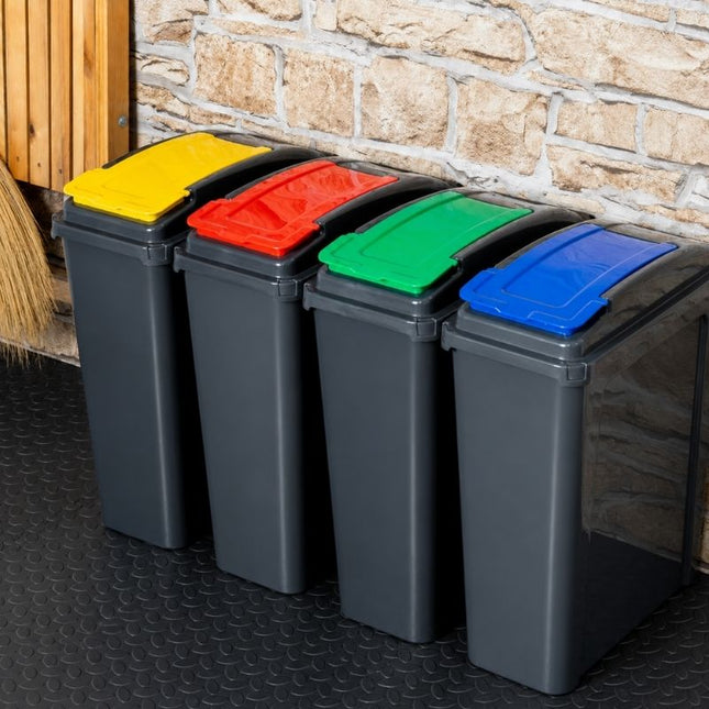 Four Wham slim recycling bins with yellow, red, green and blue lids arranged as a waste-sorting station.