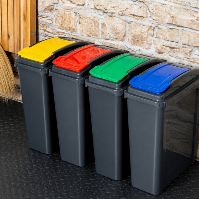 Four Wham slim recycling bins with yellow, red, green and blue lids arranged as a waste-sorting station.