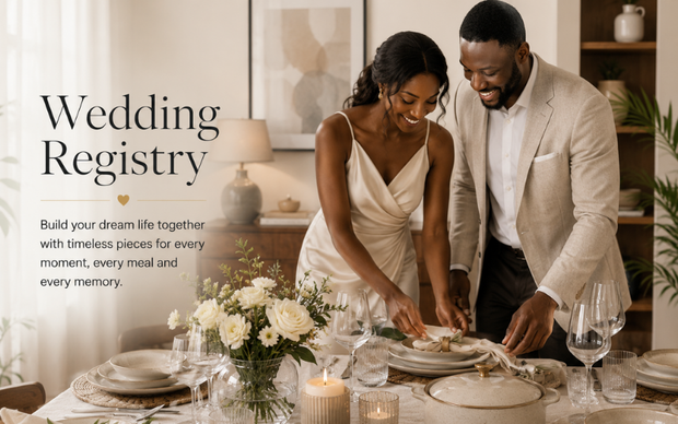 Beautiful couple arranging an elegant dining table for their Napev wedding registry